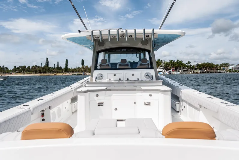 Relentless Yacht Photos Pics HCB 53 Sueños 2021 boat on water, featuring spacious deck and modern design.