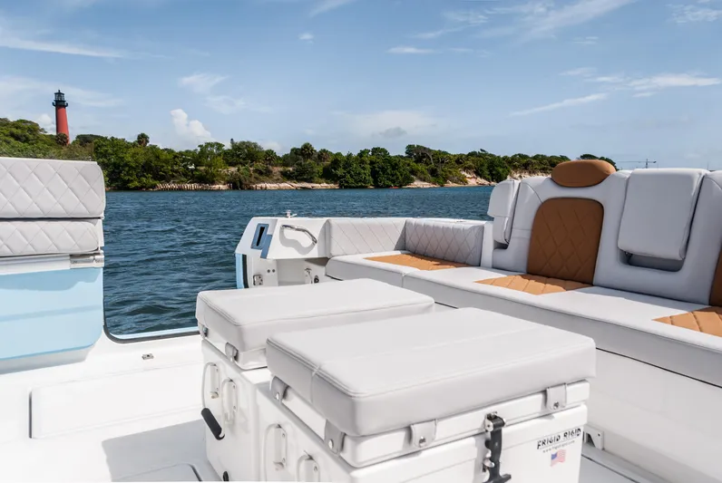 Relentless Yacht Photos Pics Luxurious 2021 HCB 53 Sueños boat interior with scenic coastal view.