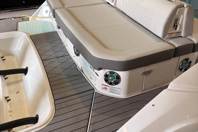  Yacht Photos Pics 2025 Searay 400 SLX boat interior with cushioned seating and integrated speakers.