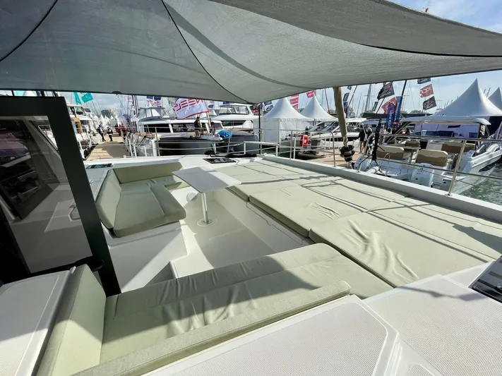 Bali 4.2 Yacht Photos Pics Luxurious Bali 4.2 yacht deck with sun loungers and canopy, 2026 model.