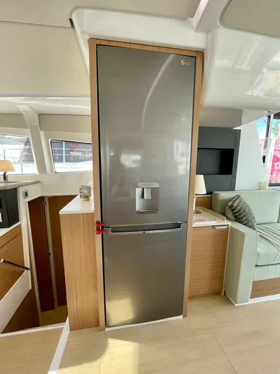 Bali 4.2 Yacht Photos Pics Modern kitchen area in a 2026 Bali 4.2 yacht with a sleek stainless steel refrigerator.