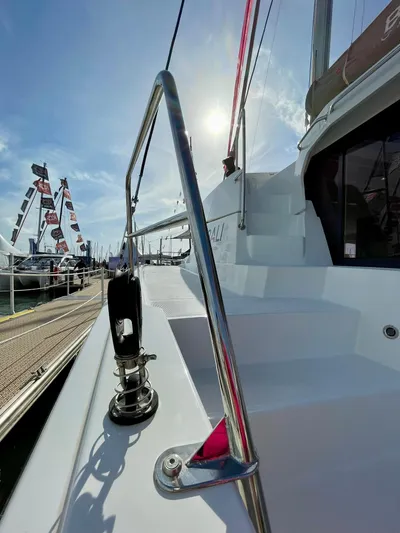 Bali 4.2 Yacht Photos Pics 2026 Bali 4.2 yacht deck with sunlight and marina view.