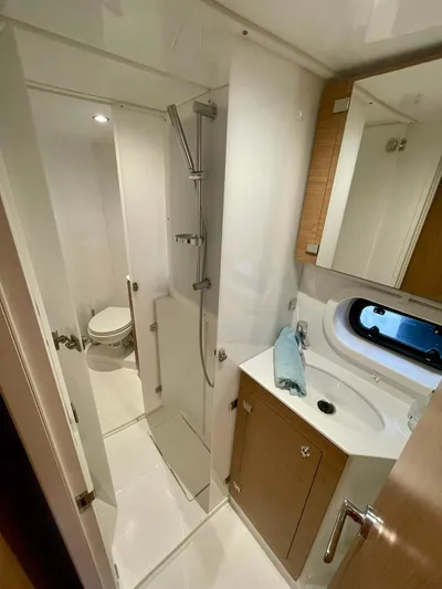 Bali 4.2 Yacht Photos Pics Modern bathroom in a 2026 Bali 4.2 yacht, featuring sleek fixtures and compact design.