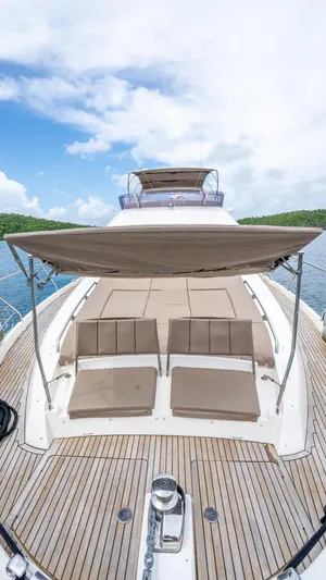  Yacht Photos Pics Prestige 620 yacht 2013 model with sun deck and canopy on calm water.