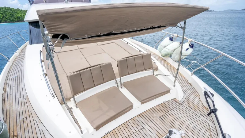  Yacht Photos Pics Prestige 620 yacht 2013 model with sunbathing deck and canopy on open water.