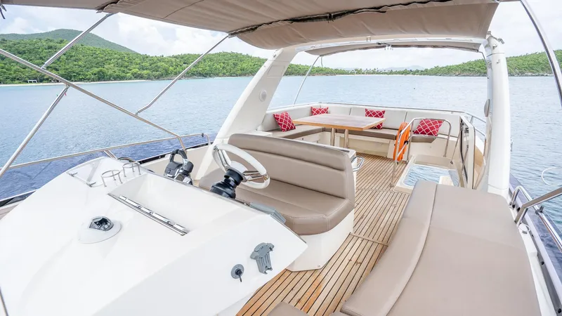  Yacht Photos Pics Luxurious 2013 Prestige 620 yacht interior with spacious seating and scenic water view.