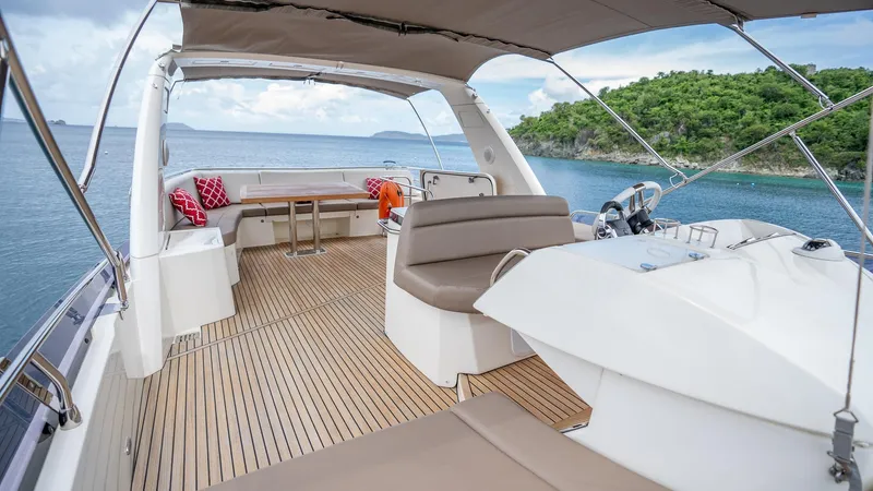  Yacht Photos Pics Luxurious 2013 Prestige 620 yacht interior with seating, table, and ocean view.