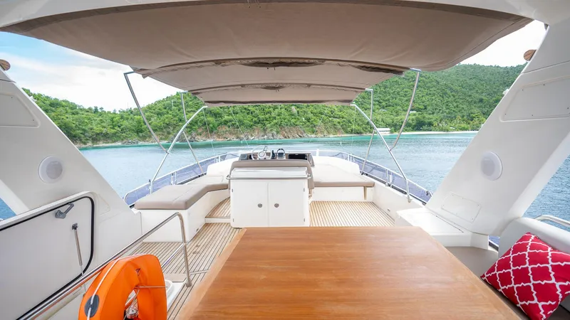  Yacht Photos Pics Flybridge of 2013 Prestige 620 yacht with scenic ocean and island view.