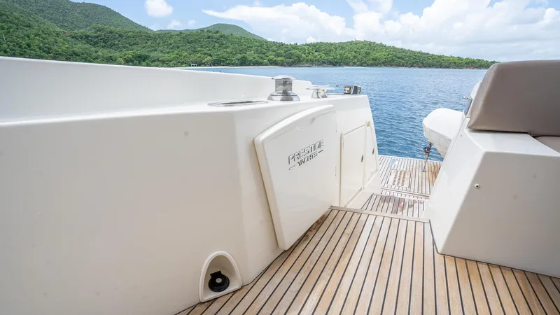  Yacht Photos Pics Prestige 620 yacht deck with scenic ocean and island view, 2013 model.