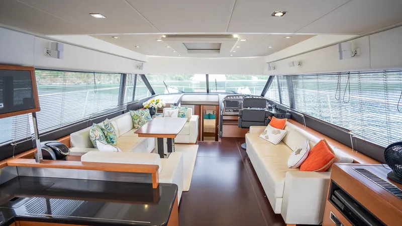  Yacht Photos Pics Luxurious interior of a 2013 Prestige 620 yacht with elegant seating and modern design.