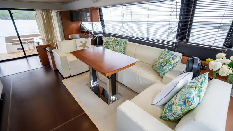  Yacht Photos Pics Luxurious interior of 2013 Prestige 620 yacht with elegant seating and modern decor.