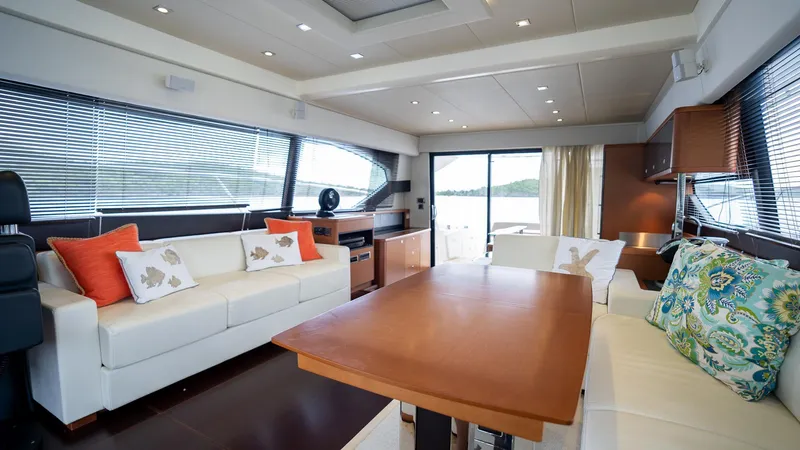  Yacht Photos Pics Luxurious interior of a 2013 Prestige 620 yacht with elegant seating and modern decor.