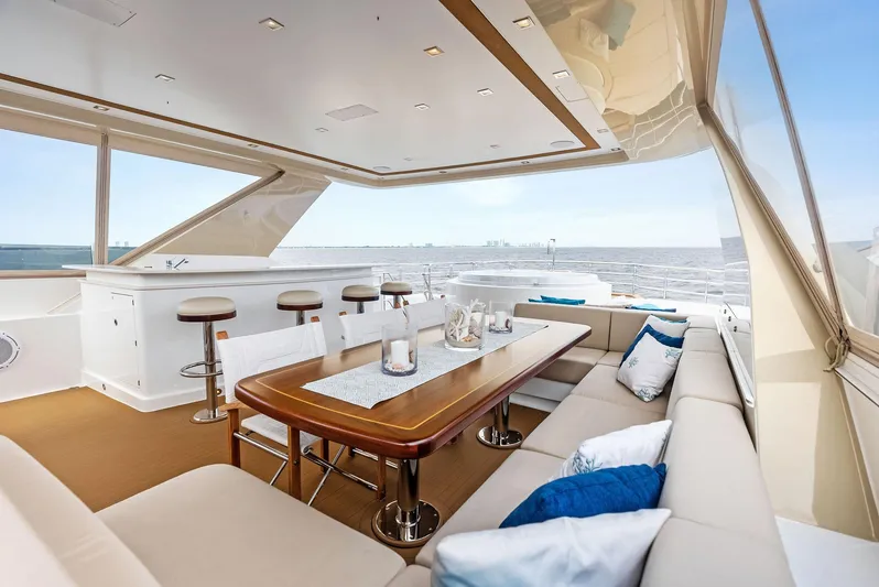 Northland Yacht Photos Pics Luxurious interior of 2017 Burger 104 Motor Yacht with elegant seating and ocean view.
