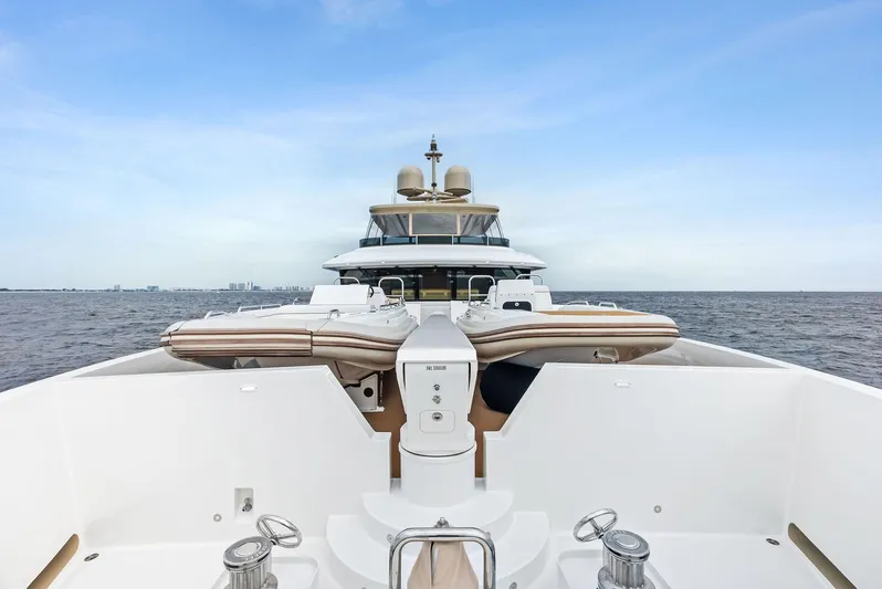 Northland Yacht Photos Pics 2017 Burger 104 Motor Yacht on open water, showcasing sleek design and luxury features.