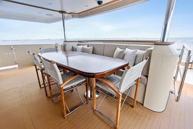 Northland Yacht Photos Pics Luxurious dining area on 2017 Burger 104 Motor Yacht with ocean view.