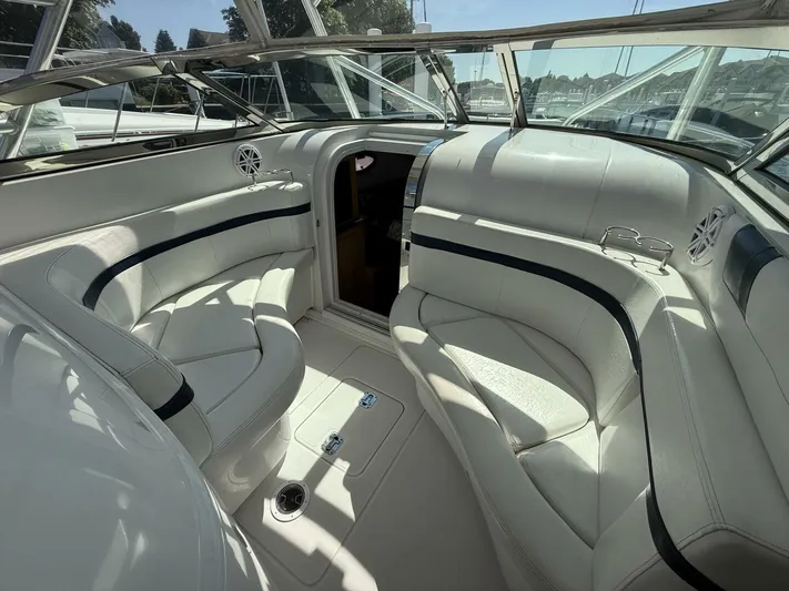  Yacht Photos Pics Luxurious interior of a 2007 Donzi 38 ZSF boat with white leather seating.