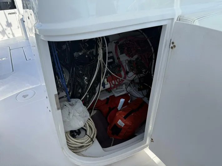  Yacht Photos Pics 2007 Donzi 38 ZSF boat storage compartment with cables and life jackets.