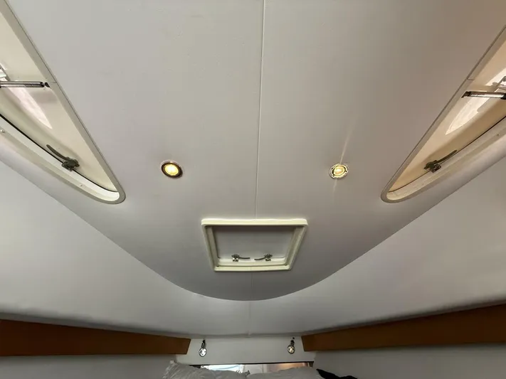  Yacht Photos Pics Interior ceiling of a 2007 Donzi 38 ZSF boat with lights and hatch.