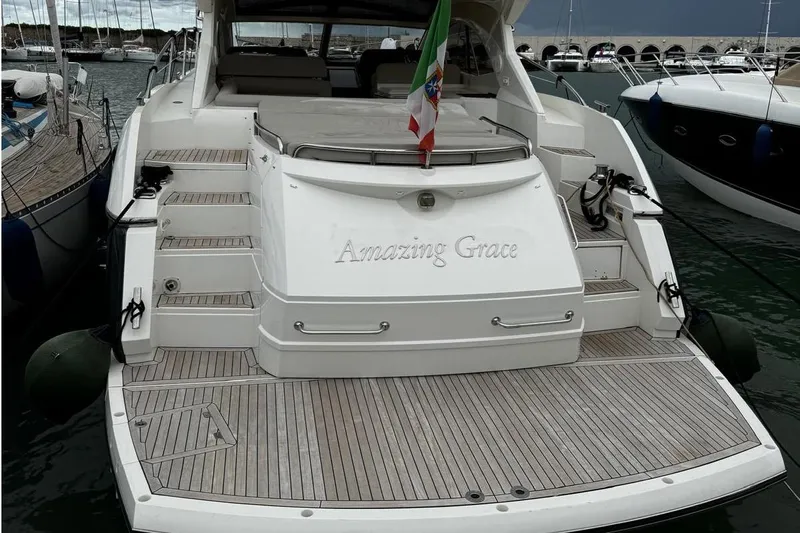  Yacht Photos Pics Sunseeker Portofino 48 yacht, 2010 model, docked with "Amazing Grace" nameplate.