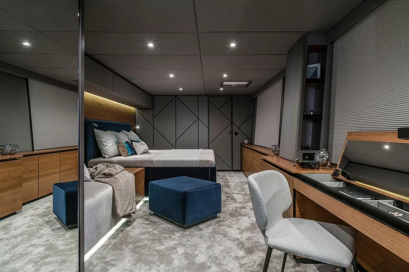  Yacht Photos Pics Luxurious interior of 2026 Sunreef 80 yacht, featuring modern bedroom and elegant furnishings.