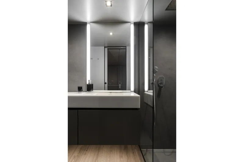  Yacht Photos Pics Modern bathroom interior on Sunreef 80 yacht, featuring sleek design and ambient lighting, 2026 model.