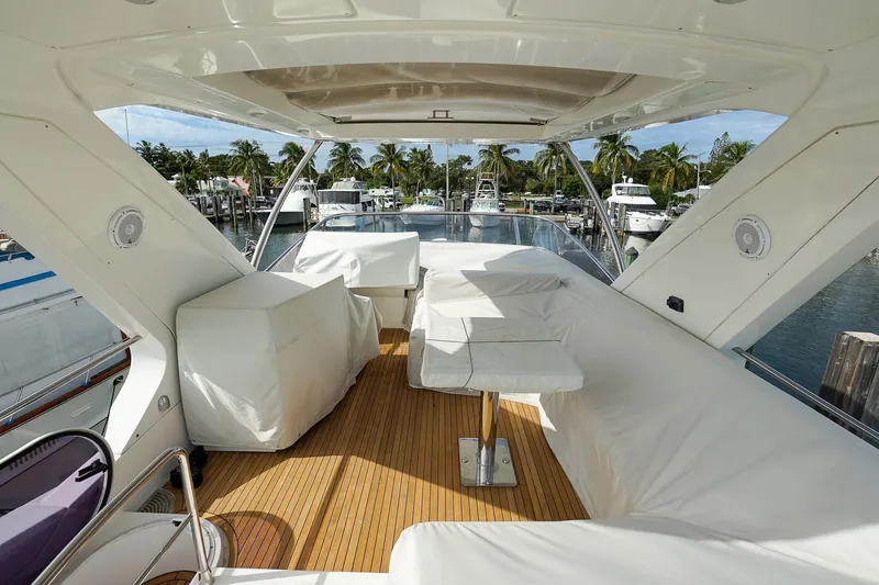 “just Chillin” Yacht Photos Pics Luxurious 2014 Azimut 54 Flybridge yacht with spacious covered seating area.