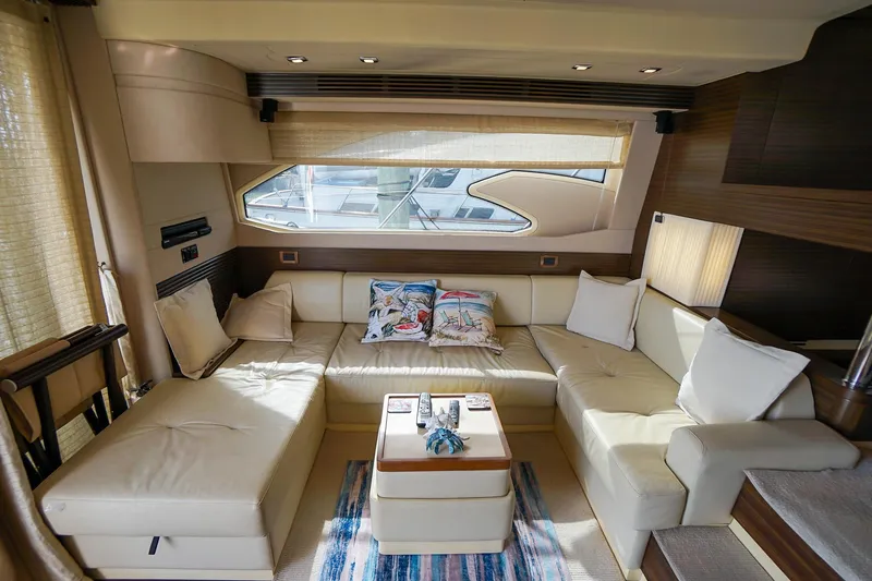 “just Chillin” Yacht Photos Pics Luxurious interior of 2014 Azimut 54 Flybridge yacht with plush seating and elegant decor.