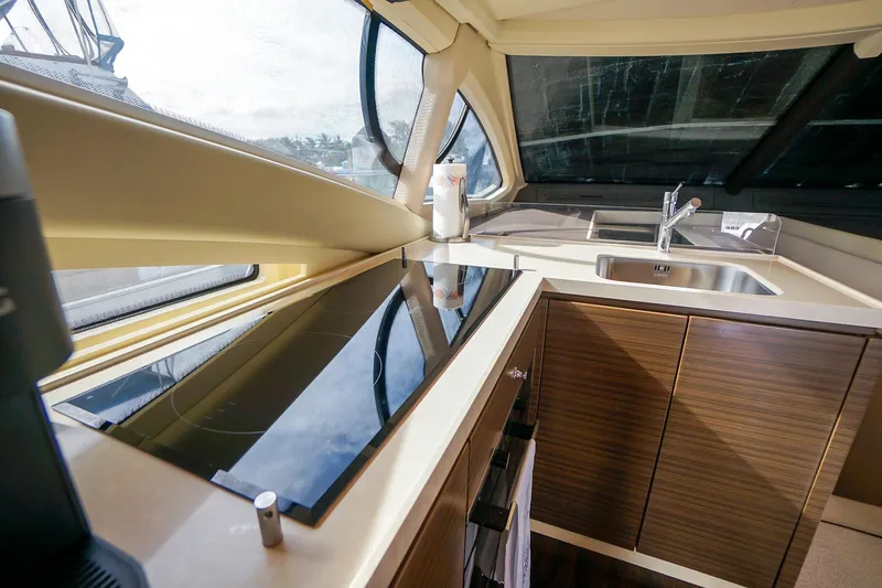 “just Chillin” Yacht Photos Pics Modern kitchen interior of 2014 Azimut 54 Flybridge yacht with sleek design and appliances.