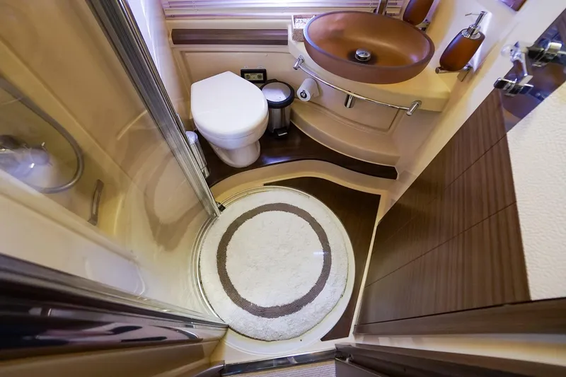 “just Chillin” Yacht Photos Pics Luxurious bathroom in 2014 Azimut 54 Flybridge yacht with modern fixtures and elegant design.