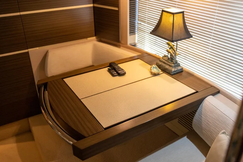 “just Chillin” Yacht Photos Pics Luxurious interior of 2014 Azimut 54 Flybridge yacht with elegant table and lamp.