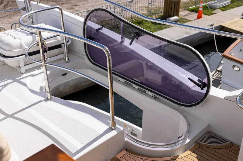 “just Chillin” Yacht Photos Pics Azimut 54 Flybridge 2014 yacht deck with sleek railings and tinted hatch.