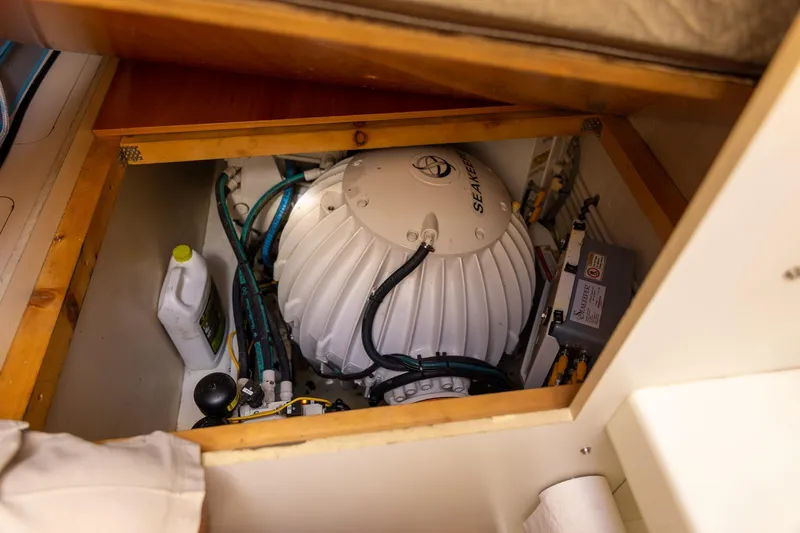 “just Chillin” Yacht Photos Pics Engine compartment of 2014 Azimut 54 Flybridge with Seakeeper stabilizer system.