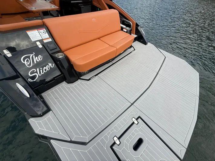  Yacht Photos Pics 2022 Cruisers Yachts 338 CX SB with tan seating and spacious swim platform.