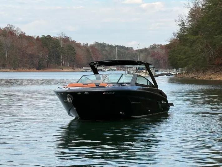  Yacht Photos Pics 2022 Cruisers Yachts 338 CX SB on serene lake with autumn trees.