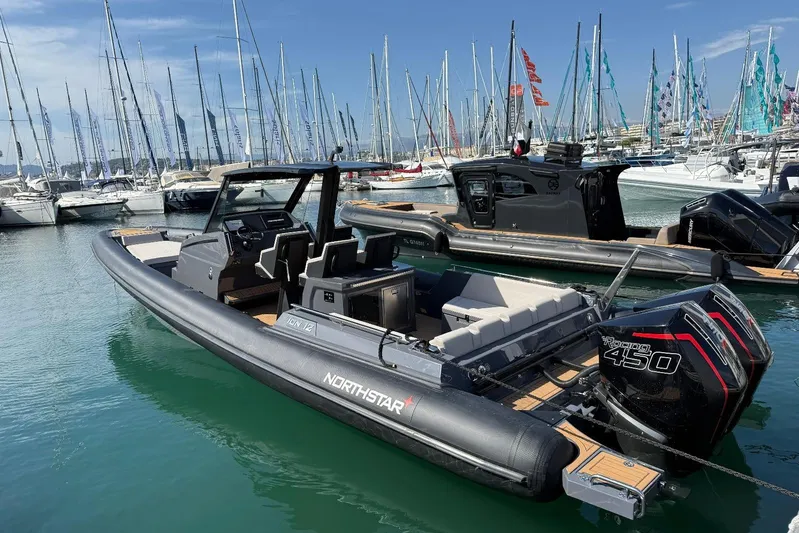  Yacht Photos Pics 2026 Northstar ION 12 boat docked in marina, featuring powerful outboard engine.