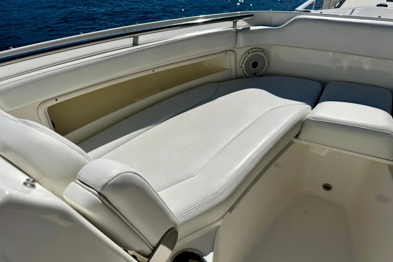  Yacht Photos Pics Luxurious seating on 2020 Pursuit DC 266 Dual Console boat with ocean backdrop.