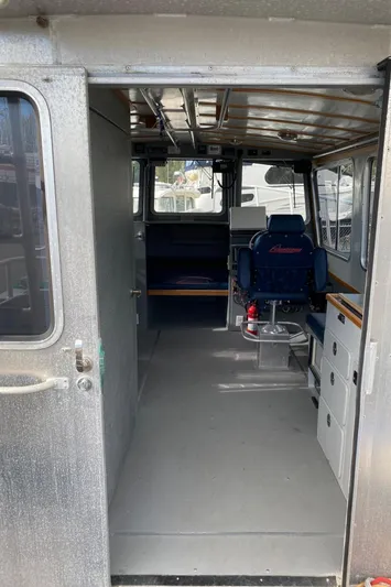 Apollo Axon Yacht Photos Pics Interior of a 2007 Armstrong Marine Catamaran, featuring seating and control area.