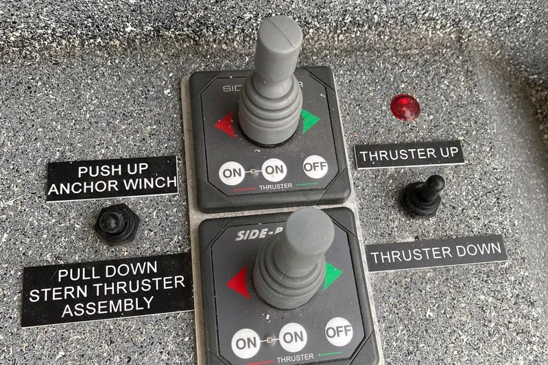 Apollo Axon Yacht Photos Pics Control panel of a 2007 Armstrong Marine Catamaran with thruster and anchor winch controls.