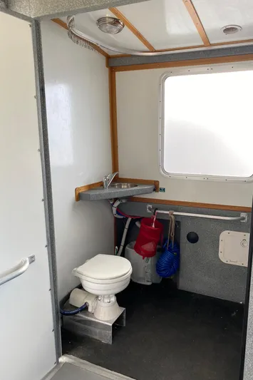 Apollo Axon Yacht Photos Pics 2007 Armstrong Marine Catamaran bathroom interior with toilet and sink.