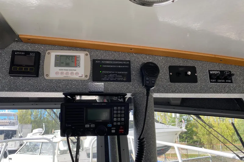 Apollo Axon Yacht Photos Pics Control panel of a 2007 Armstrong Marine Catamaran with radio and navigation instruments.