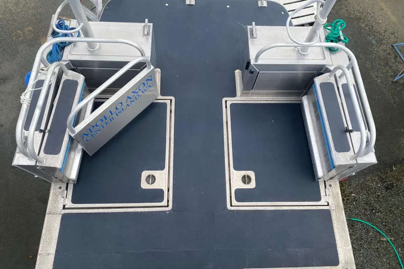 Apollo Axon Yacht Photos Pics 2007 Armstrong Marine Catamaran deck with seating and safety railings.