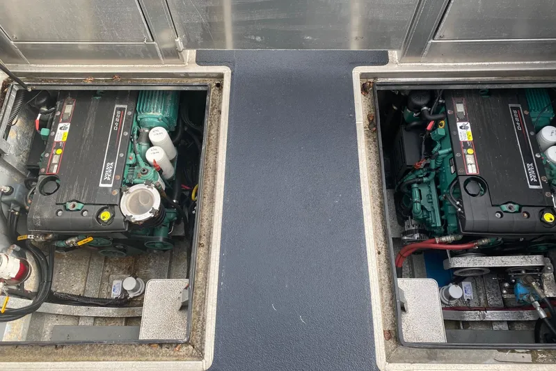 Apollo Axon Yacht Photos Pics Engine compartments of a 2007 Armstrong Marine Catamaran, showcasing dual engines.