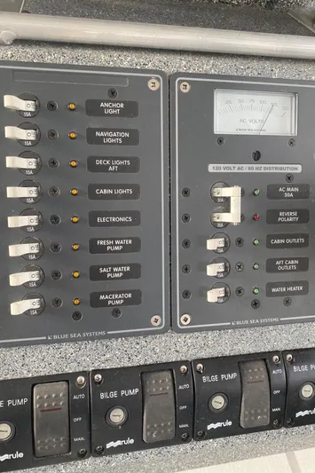 Apollo Axon Yacht Photos Pics Control panel of a 2007 Armstrong Marine Catamaran, featuring switches and gauges.