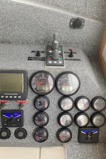 Apollo Axon Yacht Photos Pics Control panel of a 2007 Armstrong Marine Catamaran with gauges and navigation equipment.