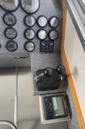 Apollo Axon Yacht Photos Pics Control panel of a 2007 Armstrong Marine Catamaran with gauges and throttle levers.