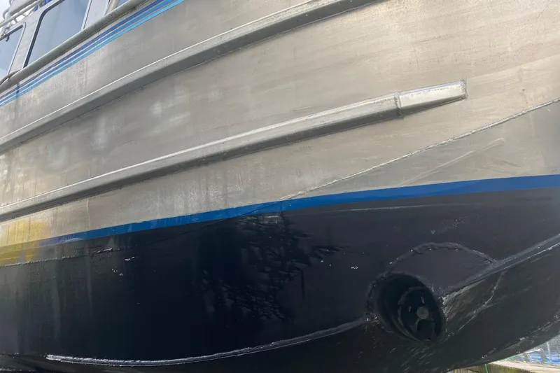 Apollo Axon Yacht Photos Pics Armstrong Marine 2007 Catamaran hull with blue and silver detailing.