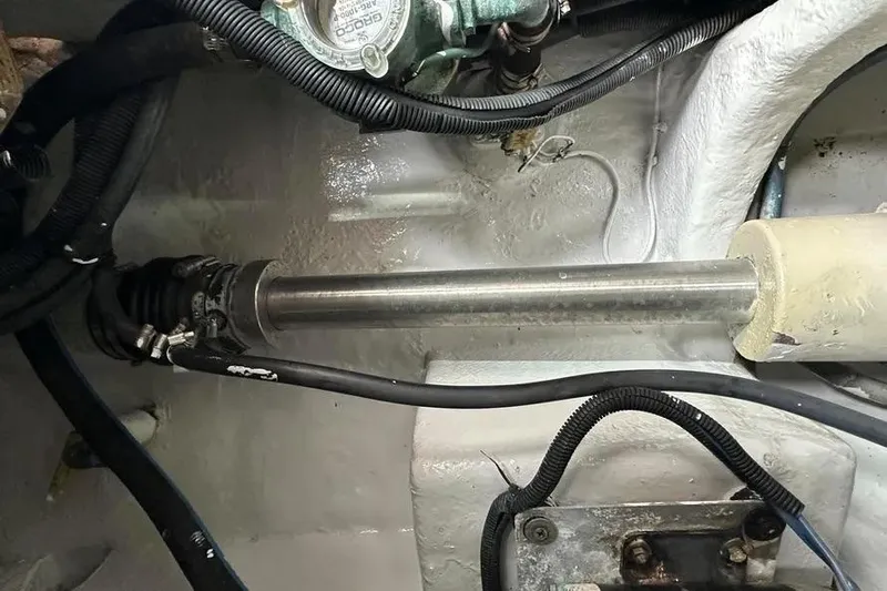  Yacht Photos Pics Engine compartment of a 2006 Sea Ray 580 Sedan Bridge, showing mechanical components and wiring.