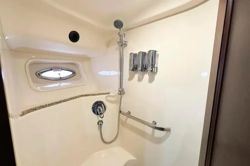  Yacht Photos Pics Luxurious shower in 2006 Sea Ray 580 Sedan Bridge yacht with modern fixtures.