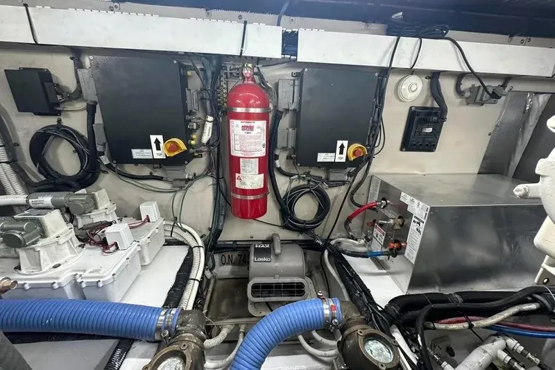  Yacht Photos Pics Engine room of 2006 Sea Ray 580 Sedan Bridge with fire extinguisher and equipment.