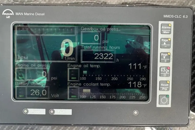  Yacht Photos Pics Display panel of 2006 Sea Ray 580 Sedan Bridge showing engine metrics and running hours.